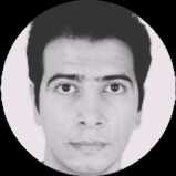 A small black and white photo in a round frame of Mr. Mohsen Rezaei, the IT manager of Lebefa Company